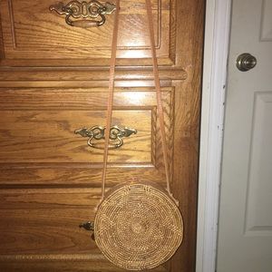 Circle straw purse cross body.